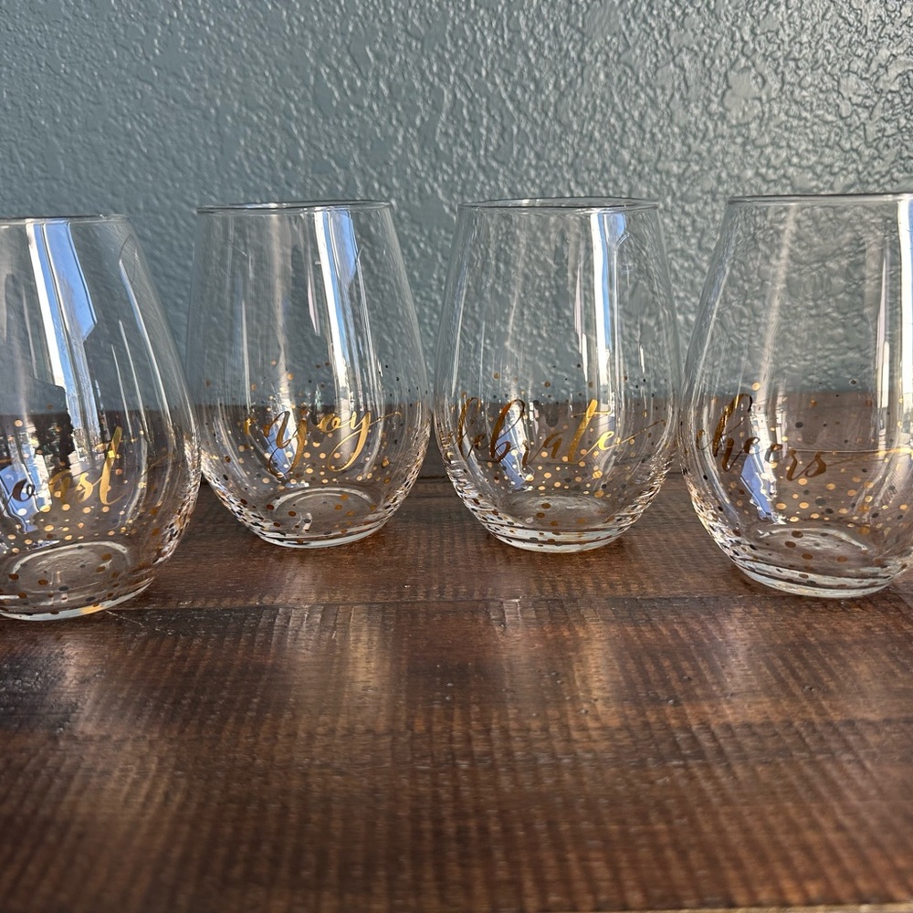 Like new celebration stemless wine glasses-set of 4.